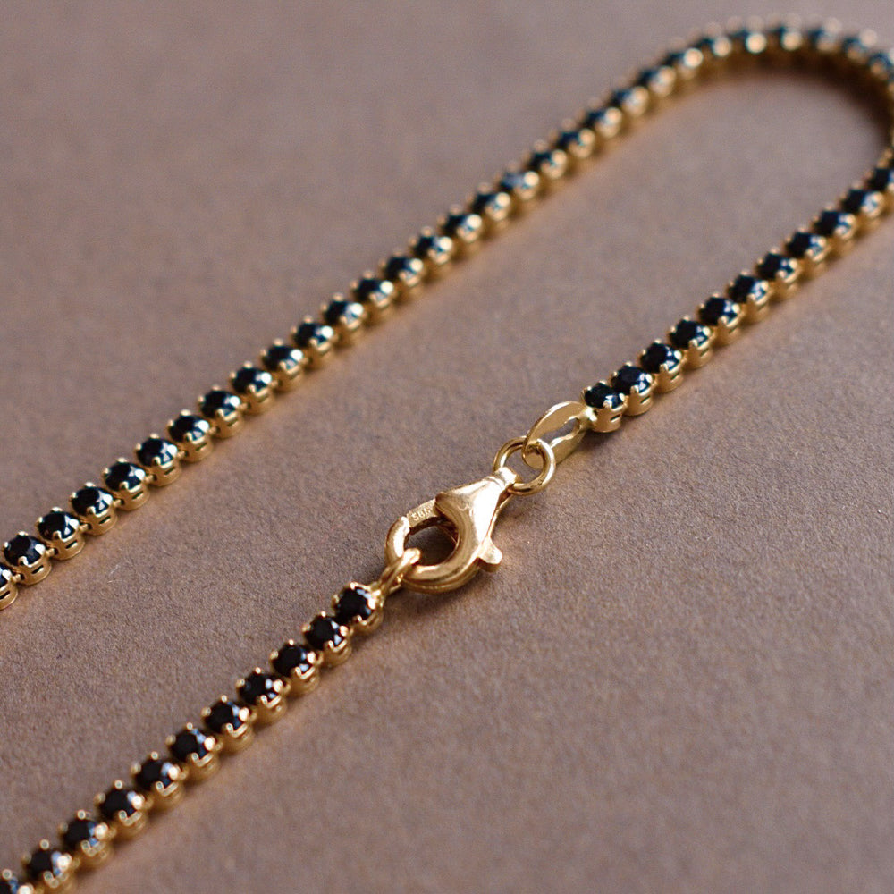 playa gold tennis bracelet with black cz diamonds
