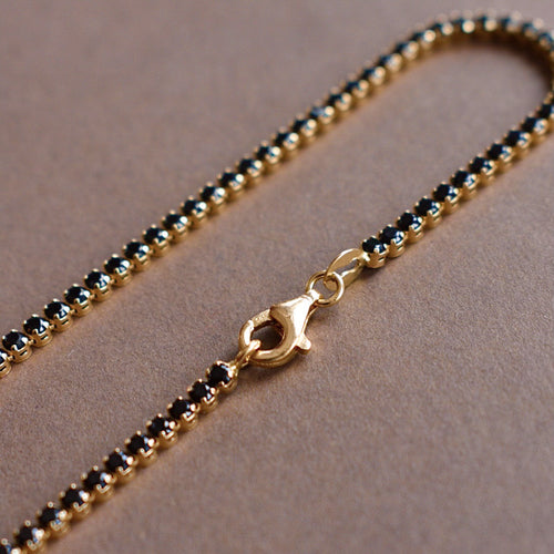 playa gold tennis bracelet with black cz diamonds