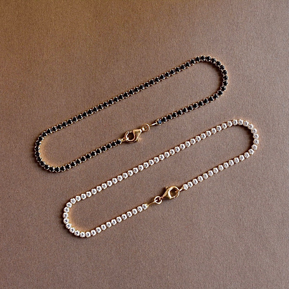 lala gold tennis bracelet with white cz diamonds
