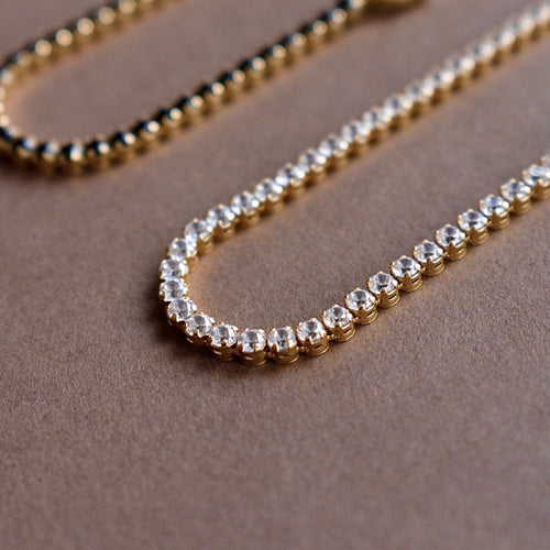 lala gold tennis bracelet with white cz diamonds
