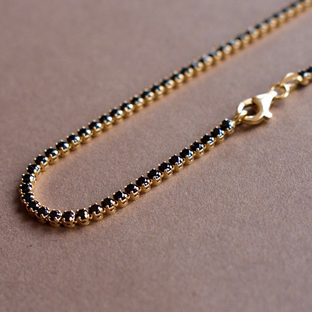 playa gold tennis bracelet with black cz diamonds