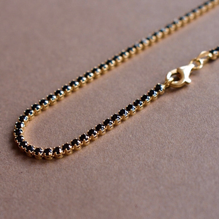 playa gold tennis bracelet with black cz diamonds